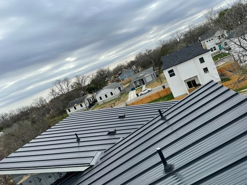 Standing seam metal roof panels with vents for Skylight Repair in Greenwood Village